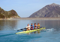 Team fun rowing in a scull