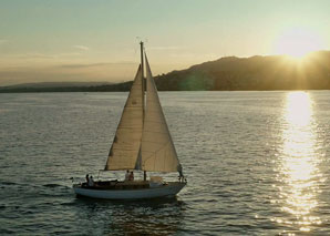 Sailing with a wooden yacht on Lake Zurich