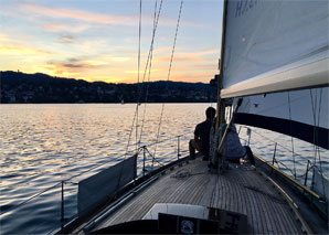 Sailing with a wooden yacht on Lake Zurich