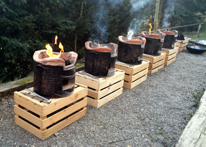 Cooking over the fire at a traditional oven house