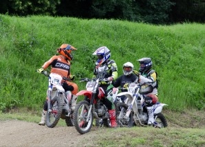 Team event with off-road motorcycling or quad biking