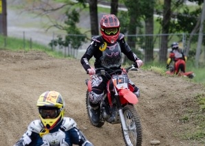 Team event with off-road motorcycling or quad biking