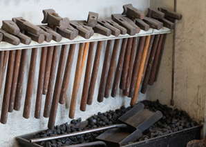 Fondue fork forging with fondue in Bern