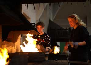 Fondue fork forging with fondue in Bern