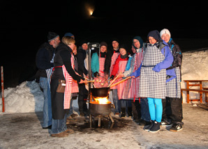 Après-Ski avec fondue dans les montagnes grisonnes