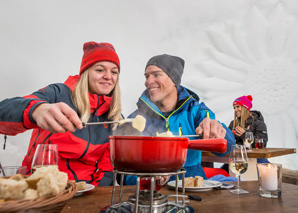 Snow shoe trek to a fondue in an igloo