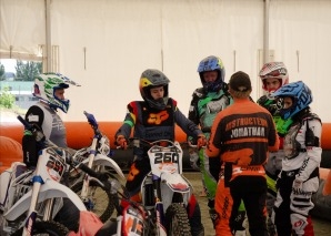 Team event with off-road motorcycling or quad biking