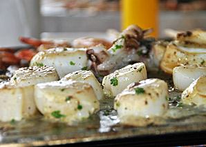 Atelier barbecue avec un grilleur professionnel