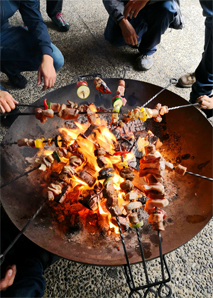 Grilling with skewers made in the forge