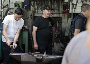 Grilling with skewers made in the forge