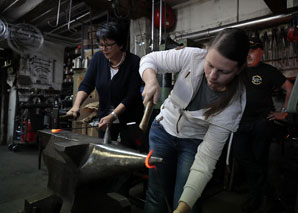 Grilling with skewers made in the forge