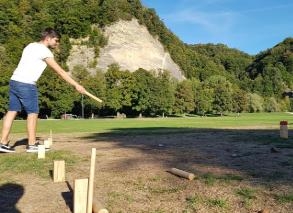 Kubb game with barbecue