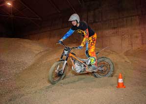 Trial motorcycle riding in the hall