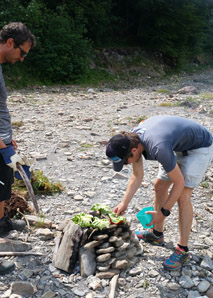 Team cooking in the Peruvian shepherd's oven