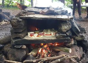 Construction et cuisson de pizzas