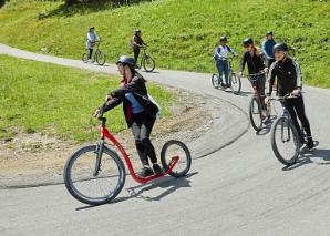 On foot and scooter in Adelboden