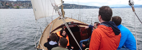 Sailing with a wooden yacht on Lake Zurich