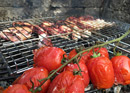 Cooking over the fire at a traditional oven house